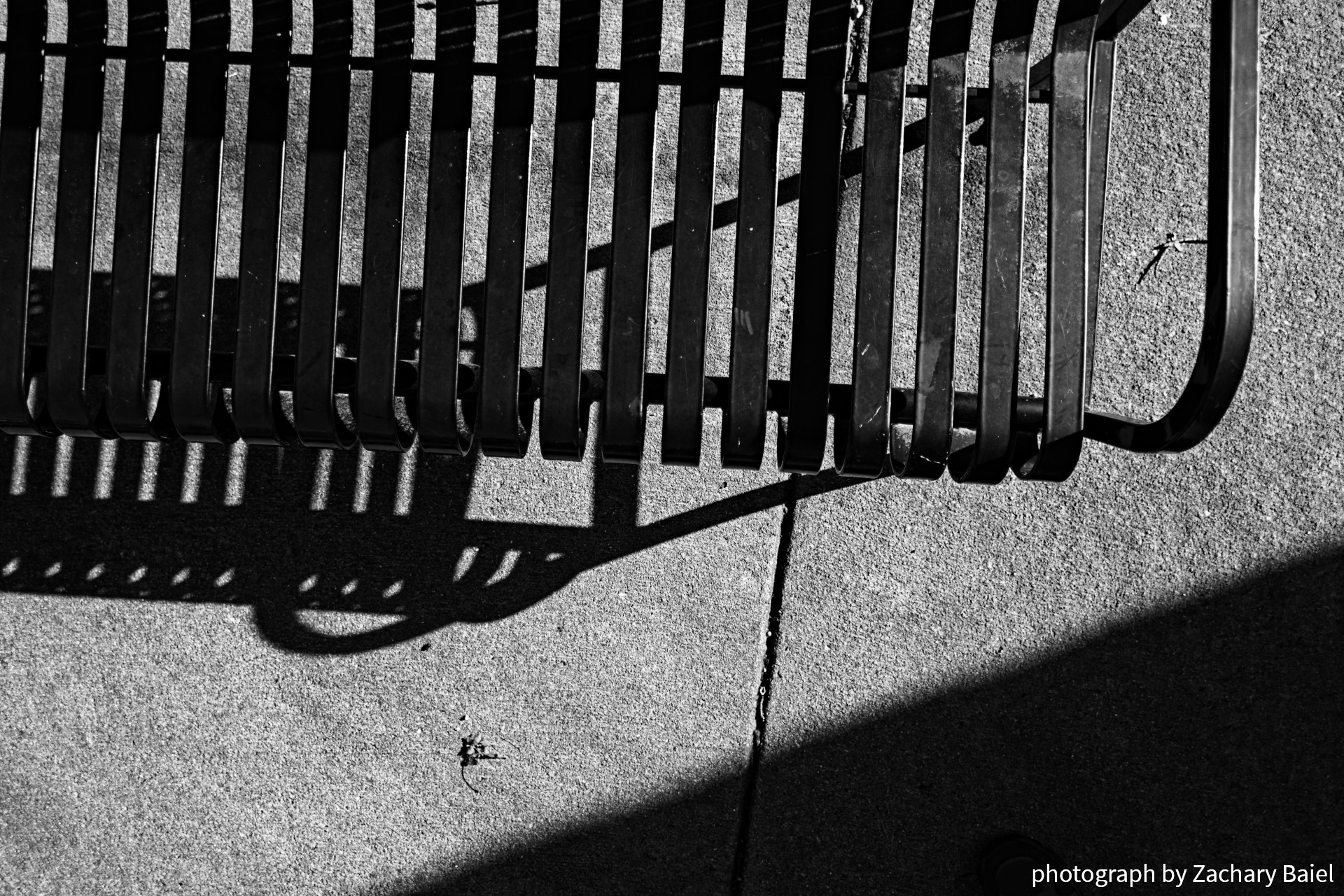 A park bench in the early afternoon sun | November 2022